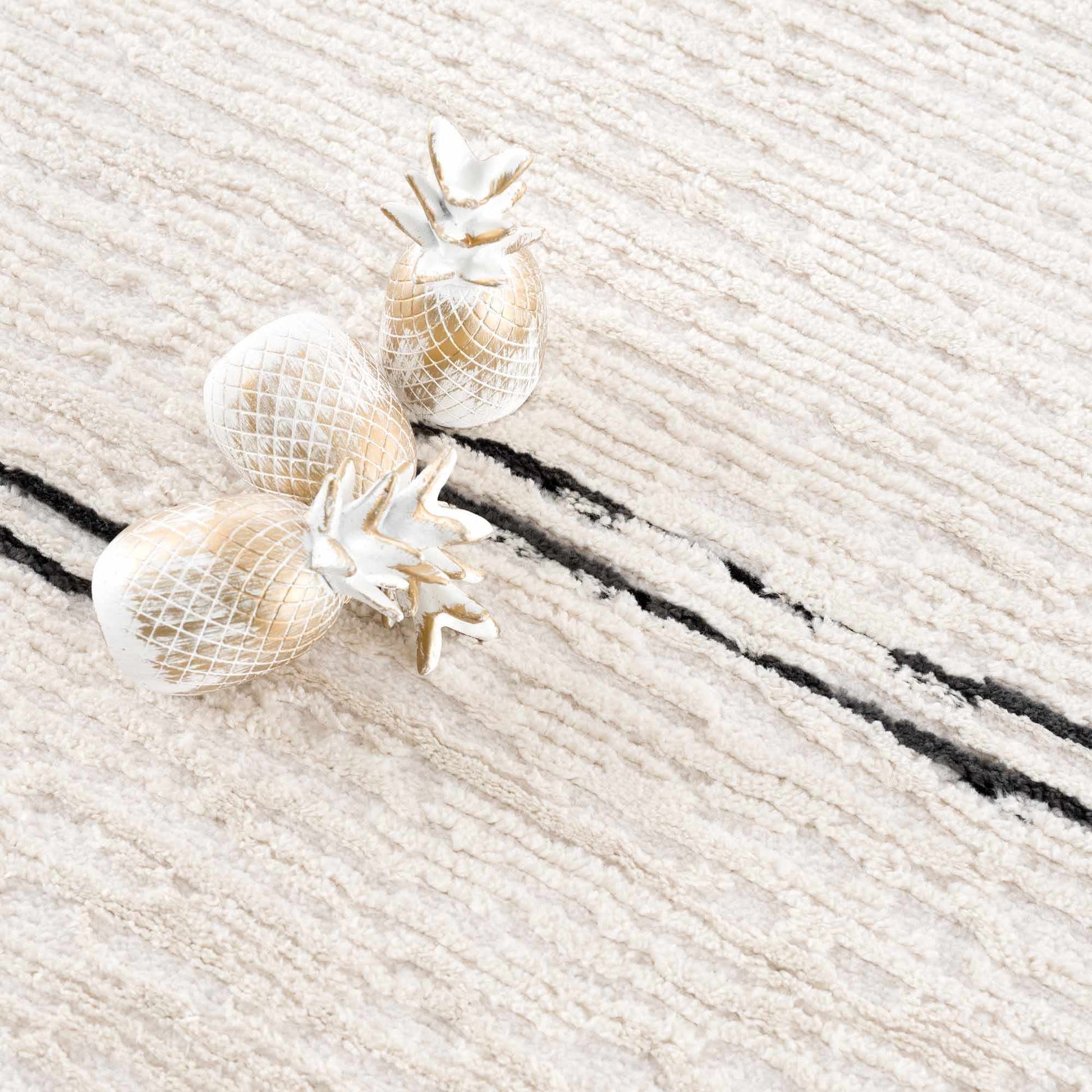 Riad Black Striped White Rug with Tassels