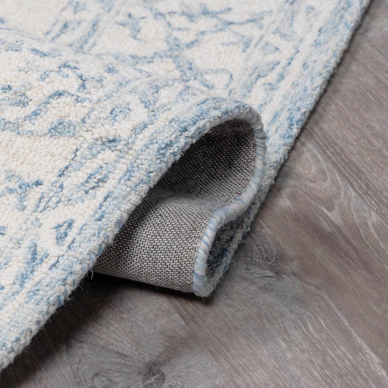 Devine Hand Tufted Wool Area Rug