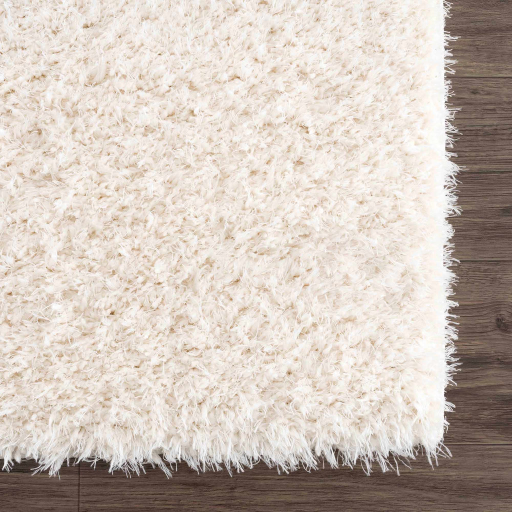 Faina Solid Cream Shag Washable Area Rug - Clearance