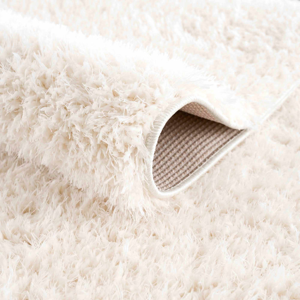 Faina Solid Cream Shag Washable Area Rug - Clearance