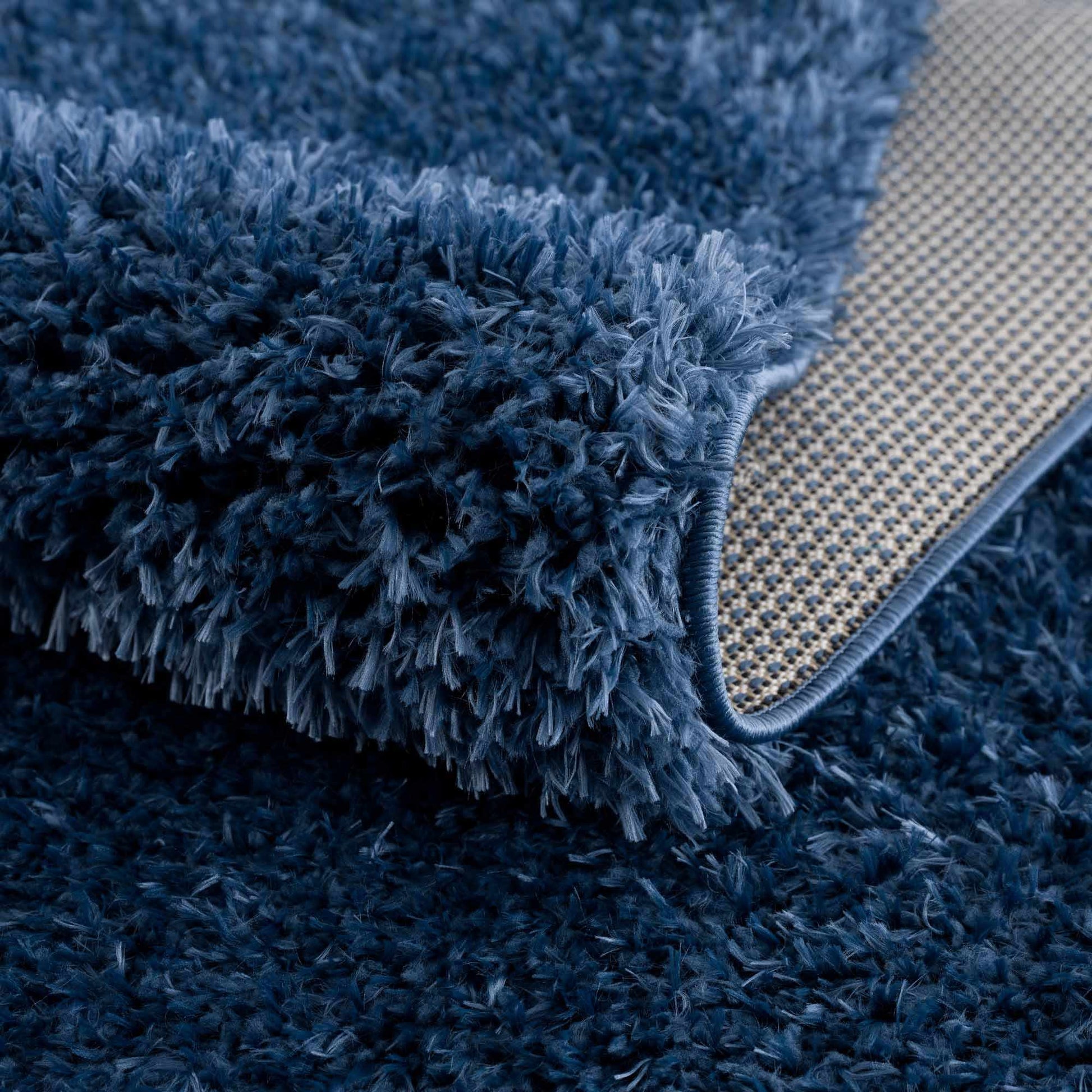 Faina Solid Dark Blue Shag Washable Area Rug - Clearance