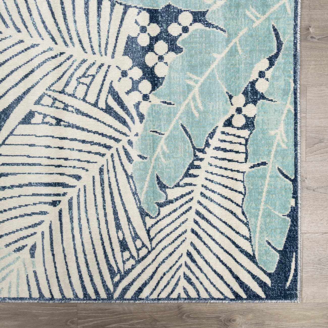 Thebarton Coastal Blue Palm Area Rug