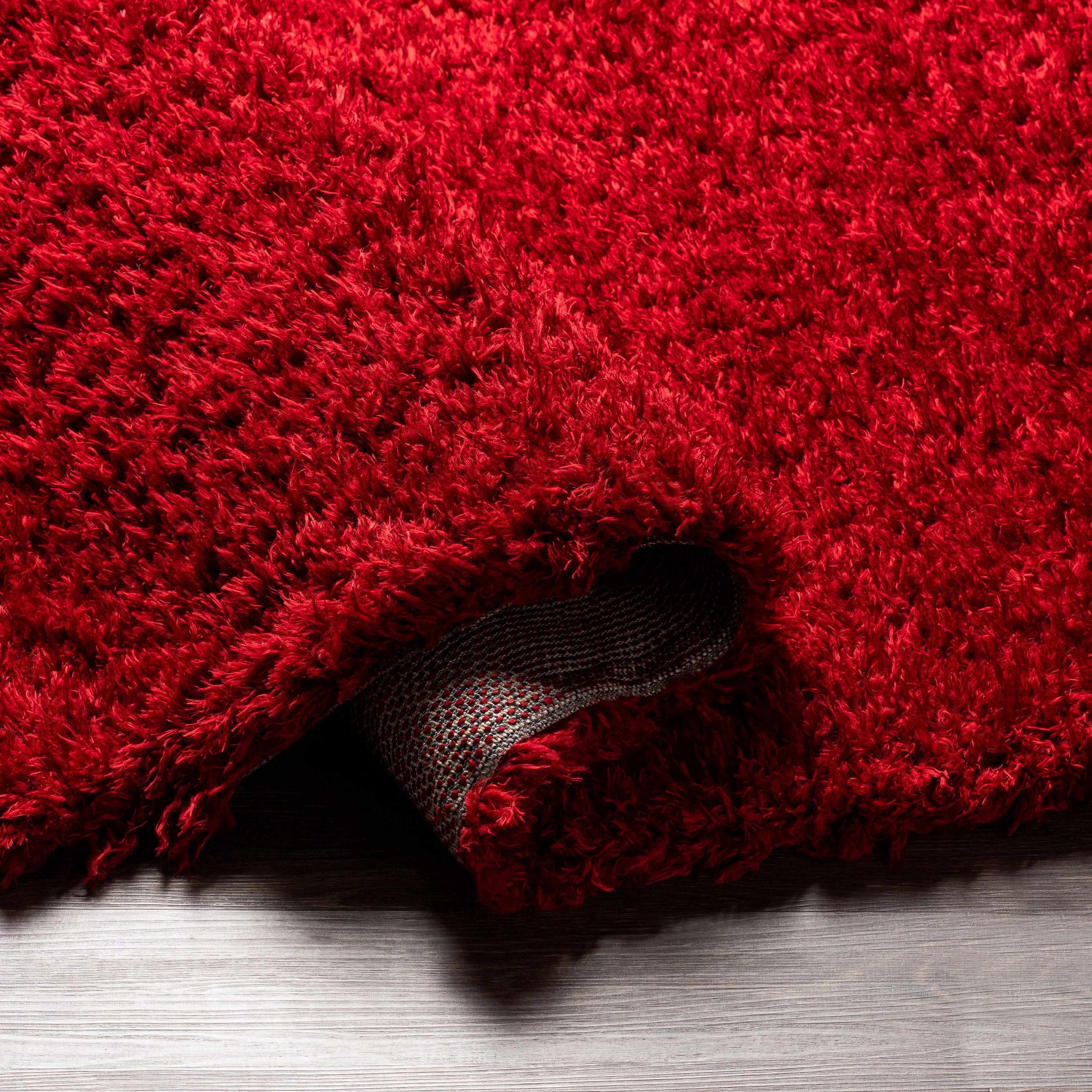 Siari Solid Red Shag Area Rug - Clearance
