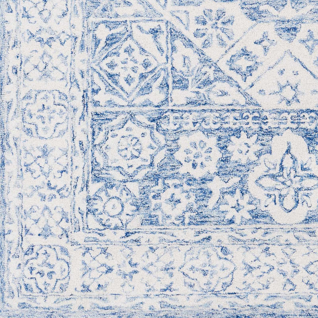 Devine Hand Tufted Wool Area Rug