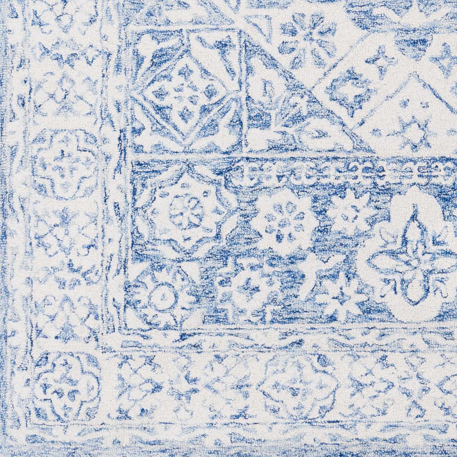 Devine Hand Tufted Wool Area Rug