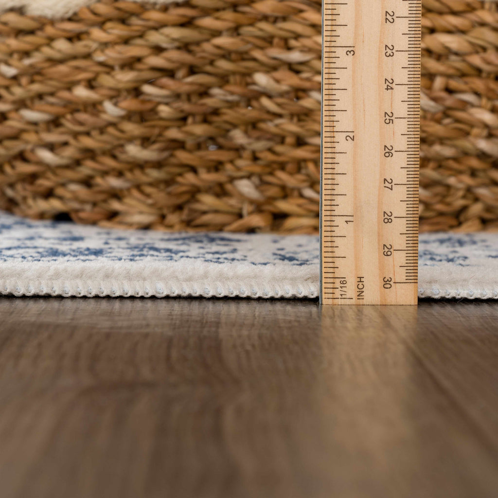 Michie Blue Area Rug - Clearance