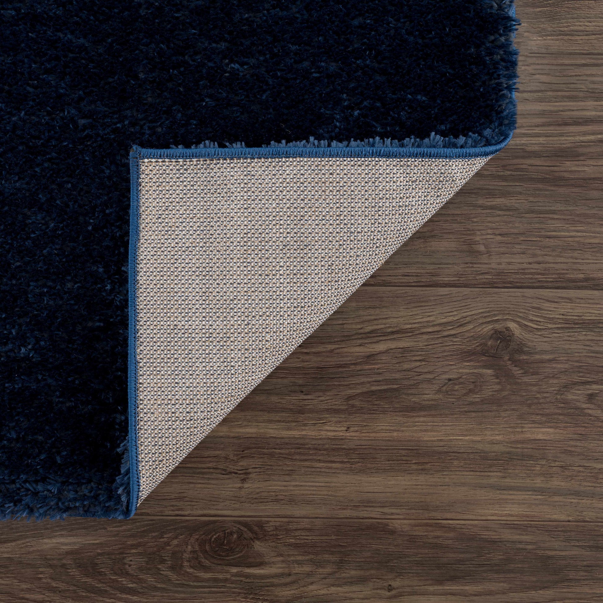 Navero Dark Blue Subtle Wavy Abstract Modern Minimalist Polyester Machine Woven Area Rug - Clearance