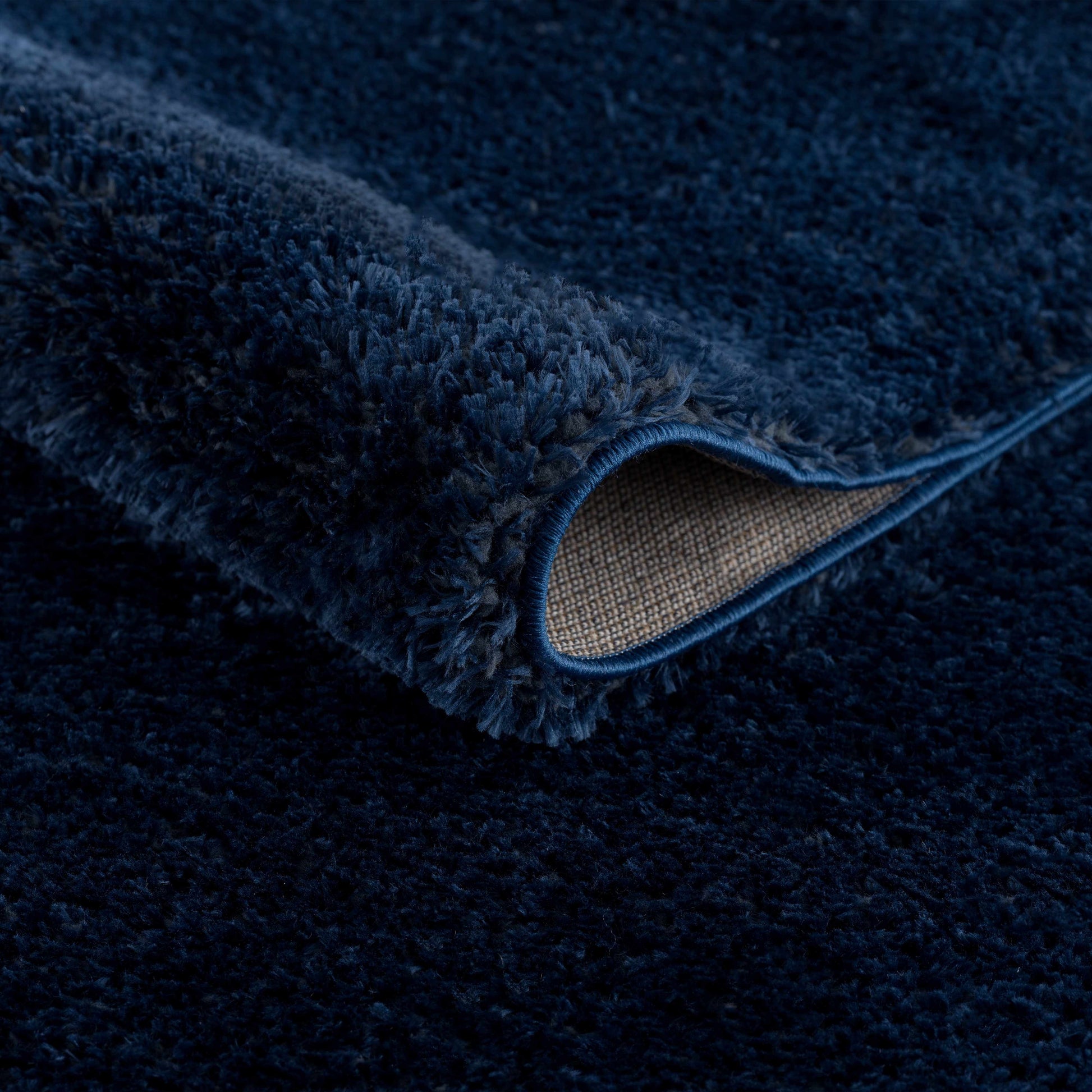 Navero Dark Blue Subtle Wavy Abstract Modern Minimalist Polyester Machine Woven Area Rug - Clearance