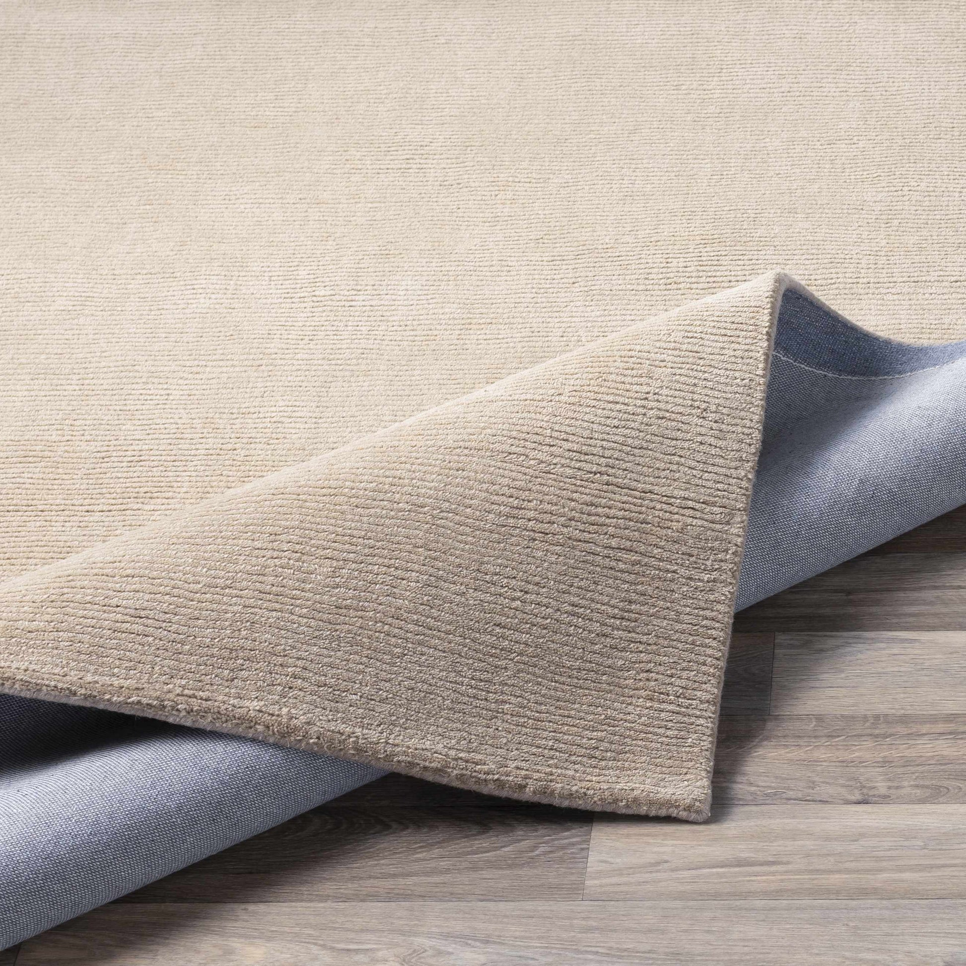 Brockton Solid Tan Hand Loomed Wool Area Rug